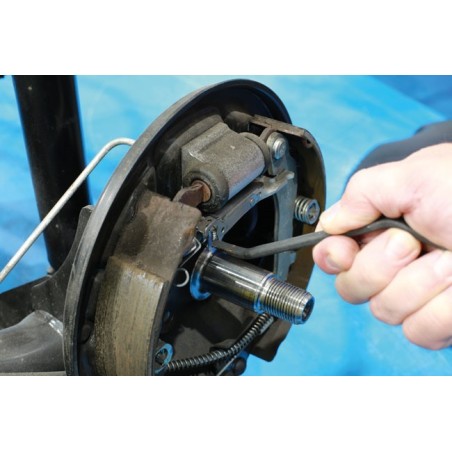 Outil de réglage de mâchoires de frein