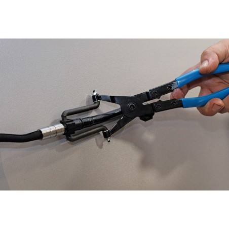 Pince pour conduites de carburant à mâchoires pivotantes