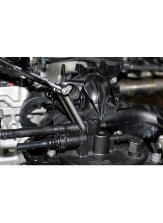 Pince pour conduites de carburant à mâchoires pivotantes