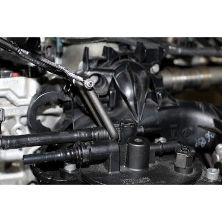 Pince pour conduites de carburant à mâchoires pivotantes